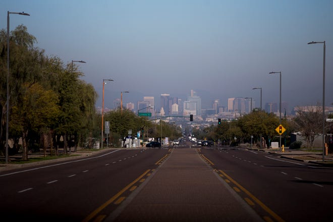 Air pollution is seen over a hazy downtown Phoenix on Jan. 2, 2020.