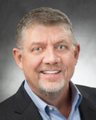 DR. GREGORY QUARLES