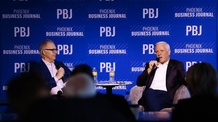 Greg Barr, Editor in Chief of the Phoenix Business Journal, left, interviews Phil Gallagher, CEO of Avnet at the Phoenix Business Journal's Meet the C- Suite event at the Phoenix Theatre Co. on Dec. 2, 2022.  