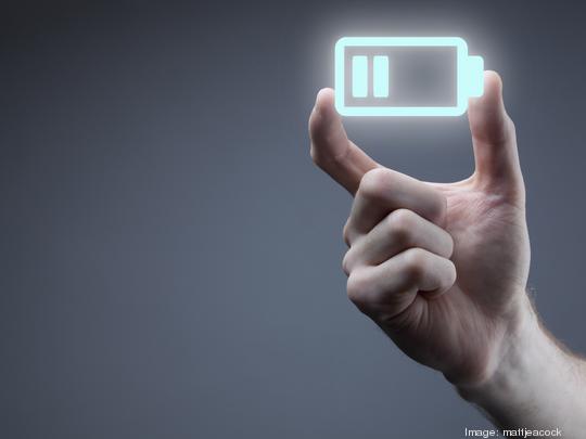 Hand holding battery icon