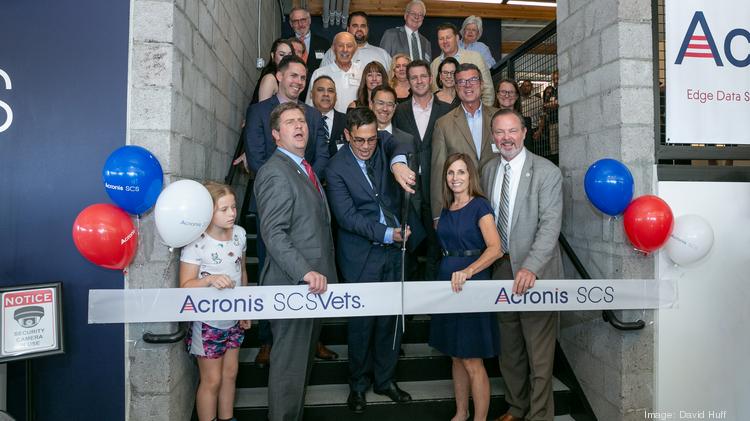 Acronis SCS CEO John Zanni officially opens his company's Scottsdale office Oct. 8, 2019 with local city and business leaders, including Congressman Greg Stanton, Sen. Martha McSally and Scottsdale Mayor Jim Lane.